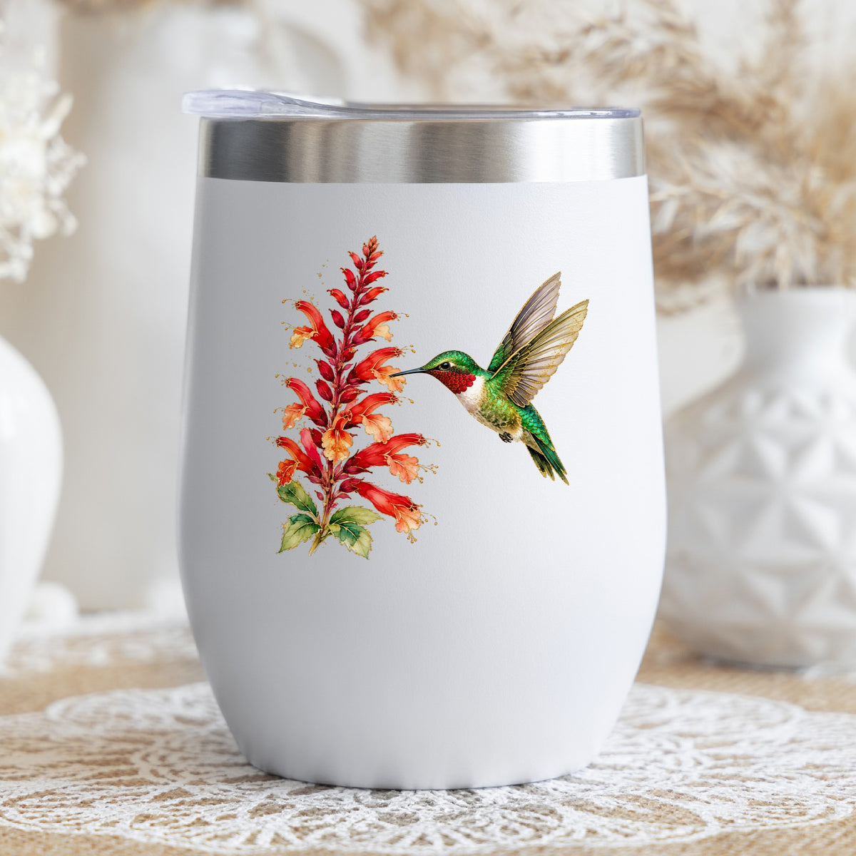 Hummingbird Red Salvia UV DTF sticker applied to a white stemless tumbler with a lid