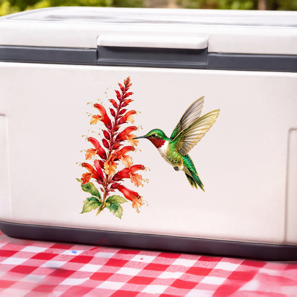 Hummingbird Red Salvia UV DTF sticker applied to a white cooler on a red gingham cloth