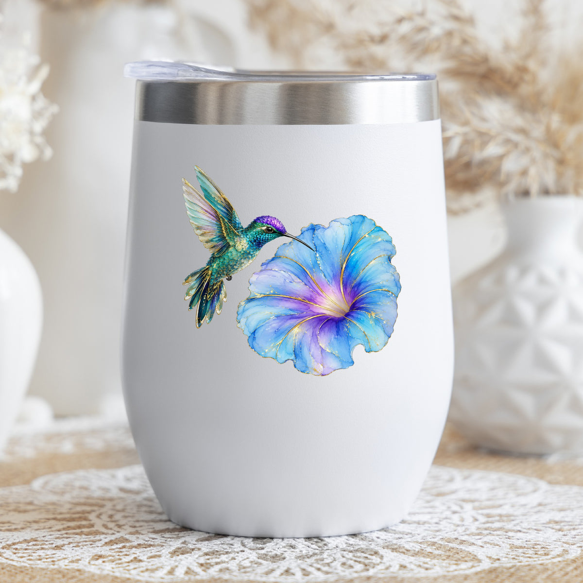 Teal Hummingbird Blue Morning Glory UV DTF sticker applied to a white stemless tumbler with a lid