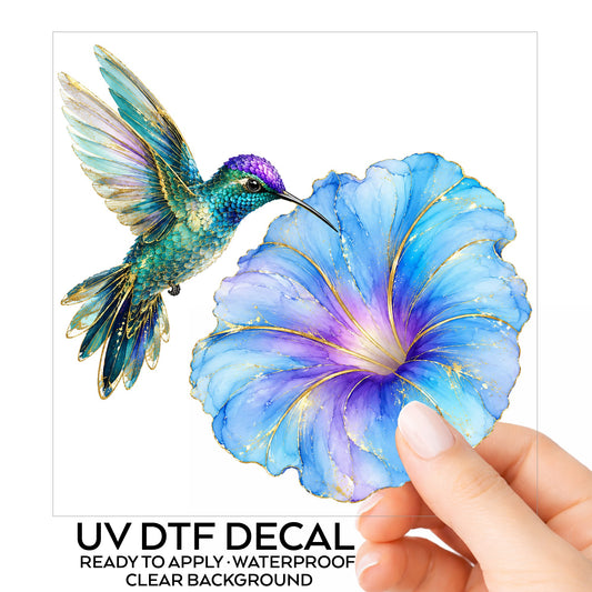 Teal Hummingbird Blue Morning Glory UV DTF sticker on its backing card, held in hand