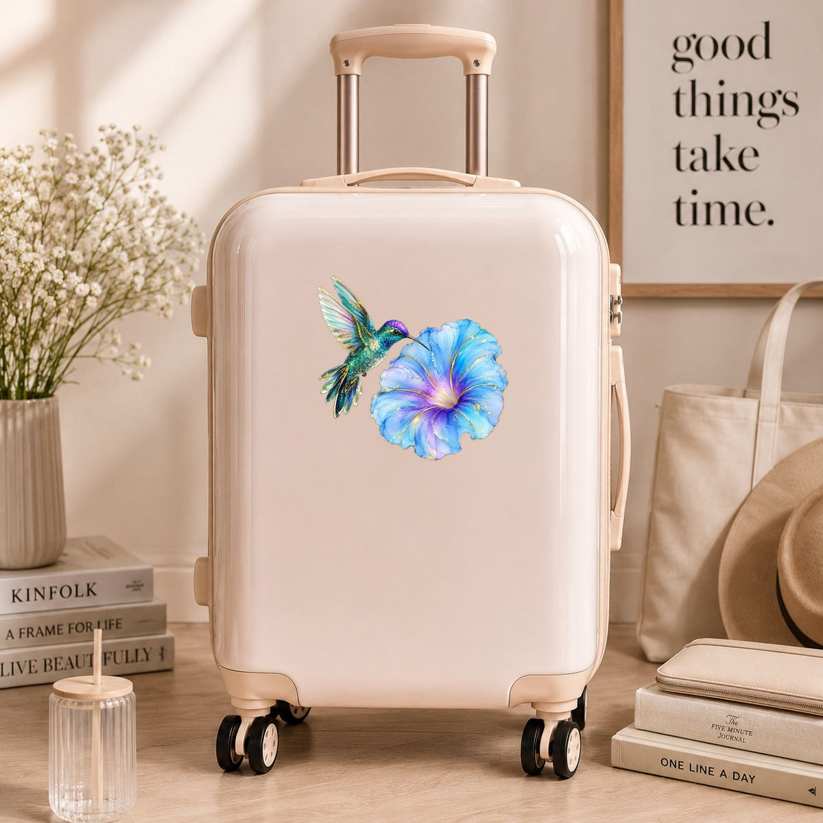Teal Hummingbird Blue Morning Glory UV DTF sticker applied to a cream carry-on suitcase