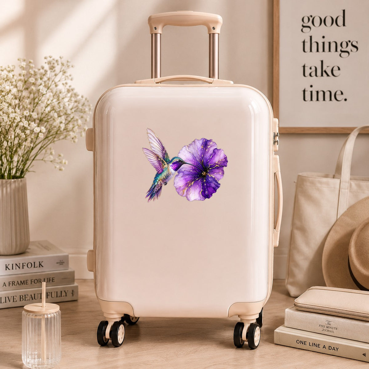 Hummingbird Purple Petunia UV DTF sticker applied to a cream carry-on suitcase