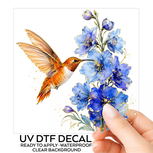 Rufous Hummingbird Blue Delphinium UV DTF sticker on its backing card, held in hand