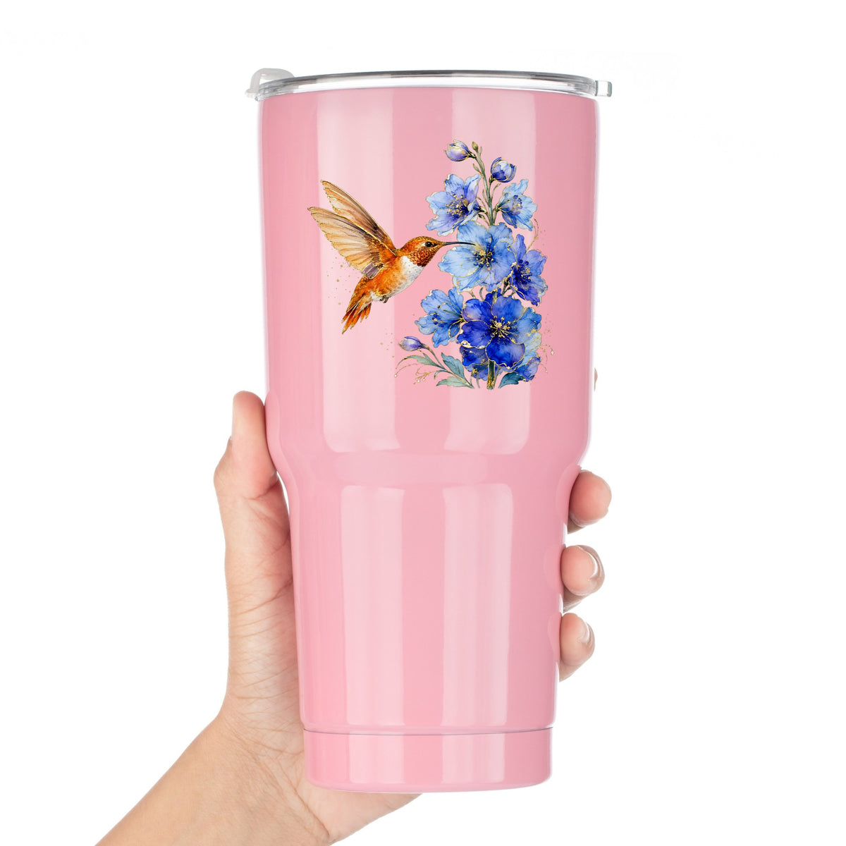 Rufous Hummingbird Blue Delphinium UV DTF sticker applied to a pink tumbler held against a white background