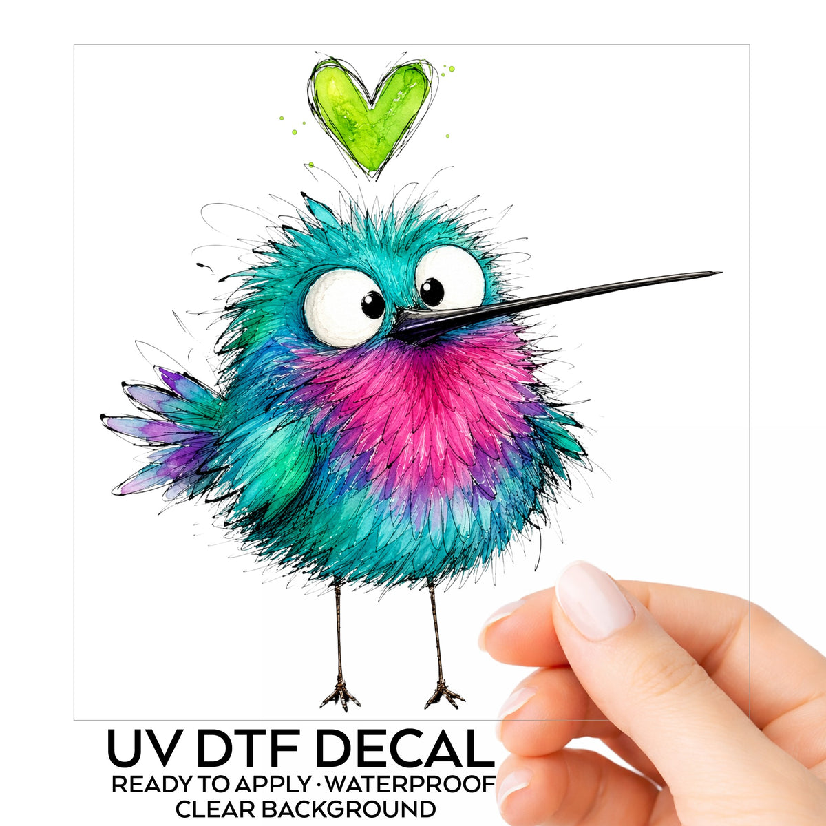 Fluffy Teal Pink Hummingbird UV DTF sticker on its backing card, held in hand