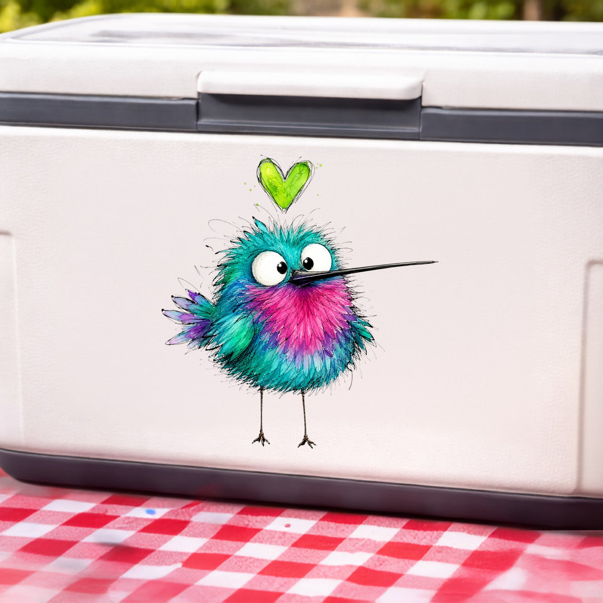Fluffy Teal Pink Hummingbird UV DTF sticker applied to a white cooler on a red gingham cloth