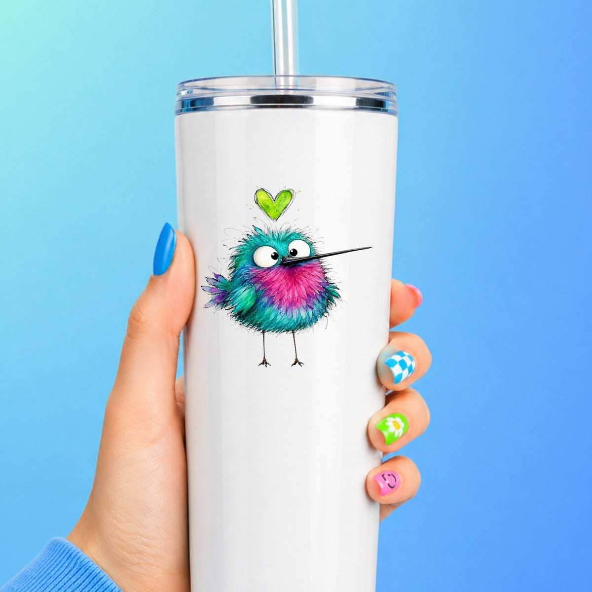 Fluffy Teal Pink Hummingbird UV DTF sticker applied to a white straw tumbler on a blue background