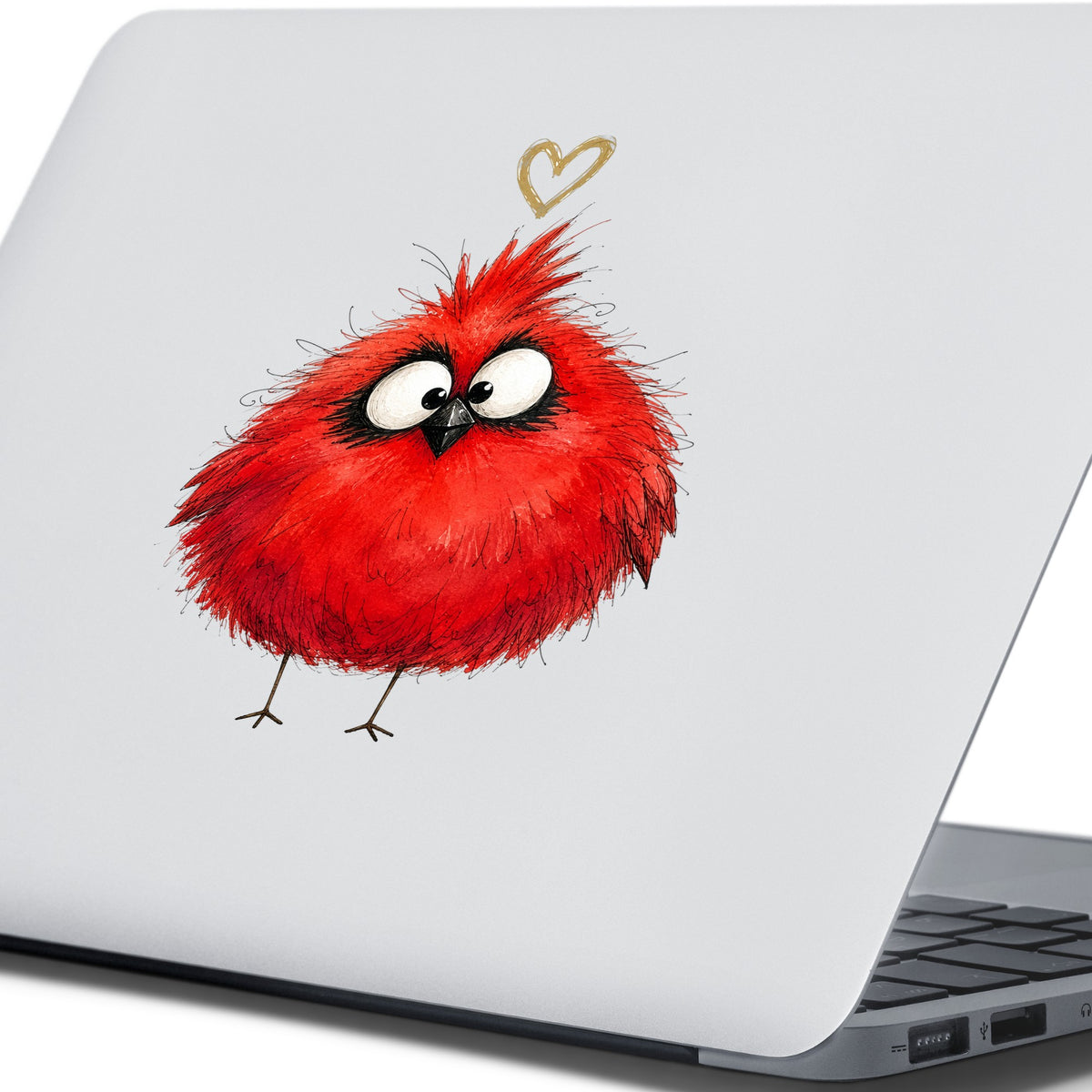 Fluffy Red Cardinal UV DTF sticker applied to the lid of a silver laptop