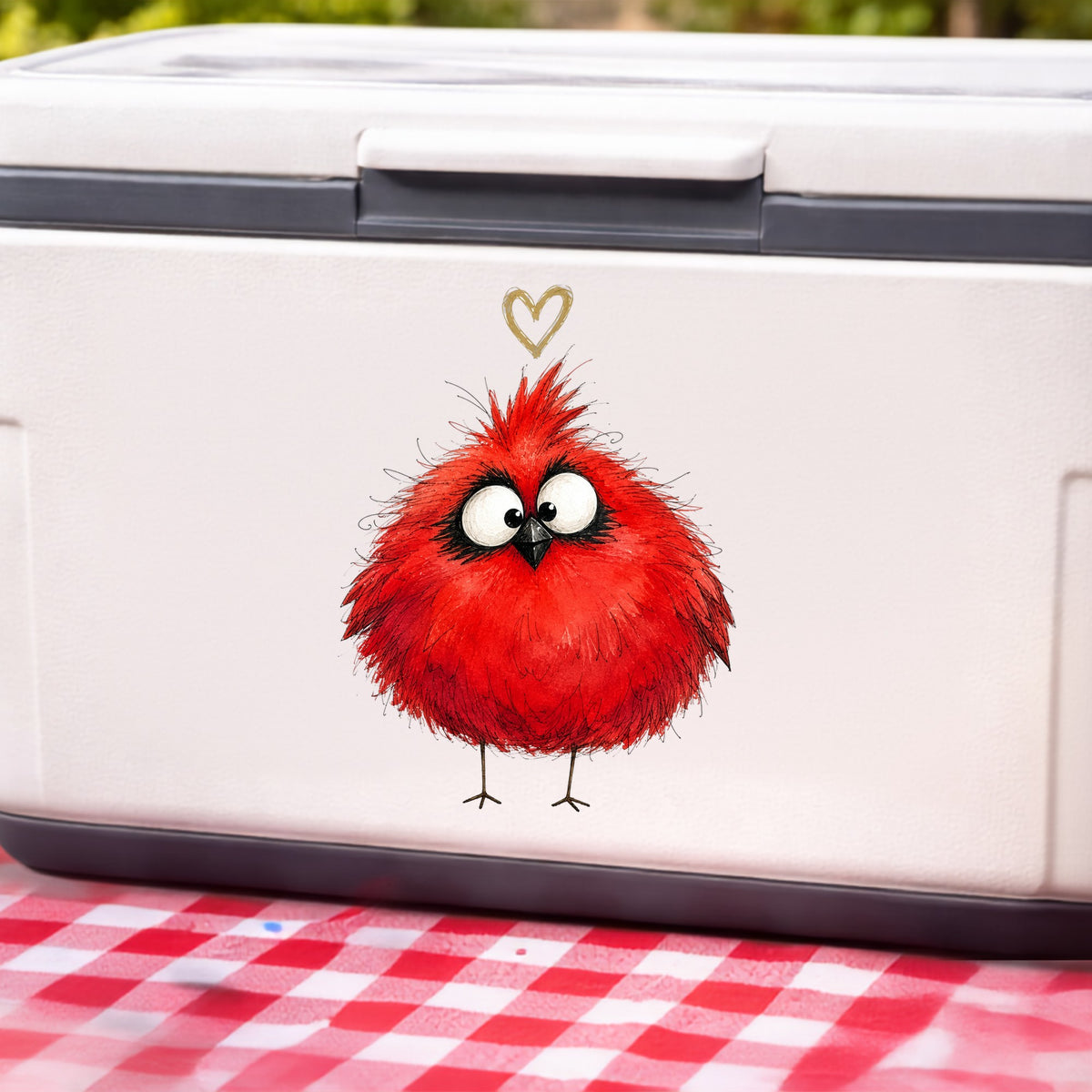 Fluffy Red Cardinal UV DTF sticker applied to a white cooler on a red gingham cloth