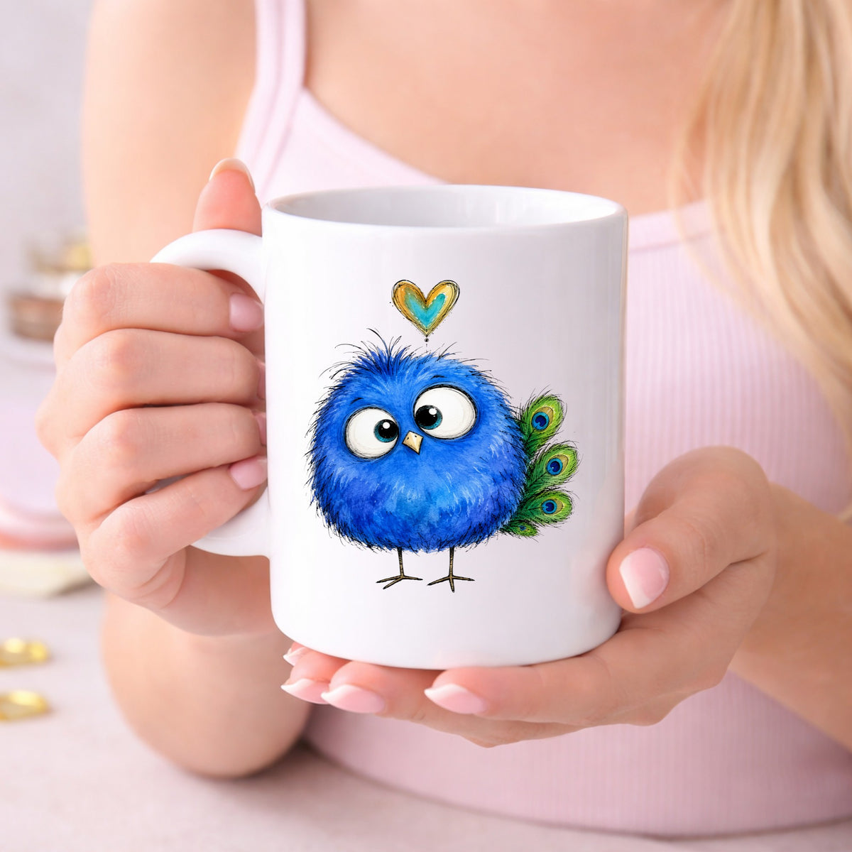 Funny Blue Peacock UV DTF sticker applied to a white coffee mug held in both hands