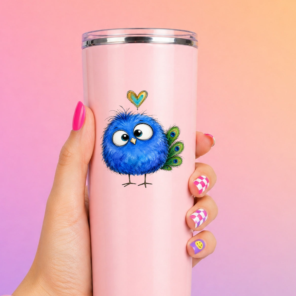 Funny Blue Peacock UV DTF sticker applied to a tall pink tumbler on a pink and orange background