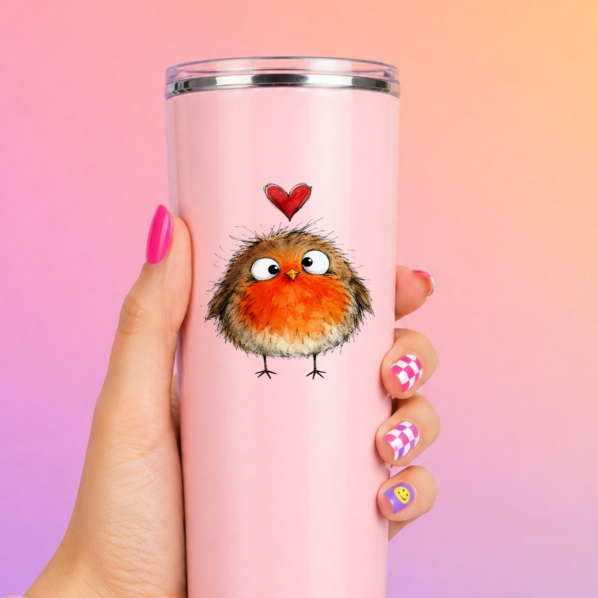 Fluffy Robin UV DTF sticker applied to a tall pink tumbler on a pink and orange background