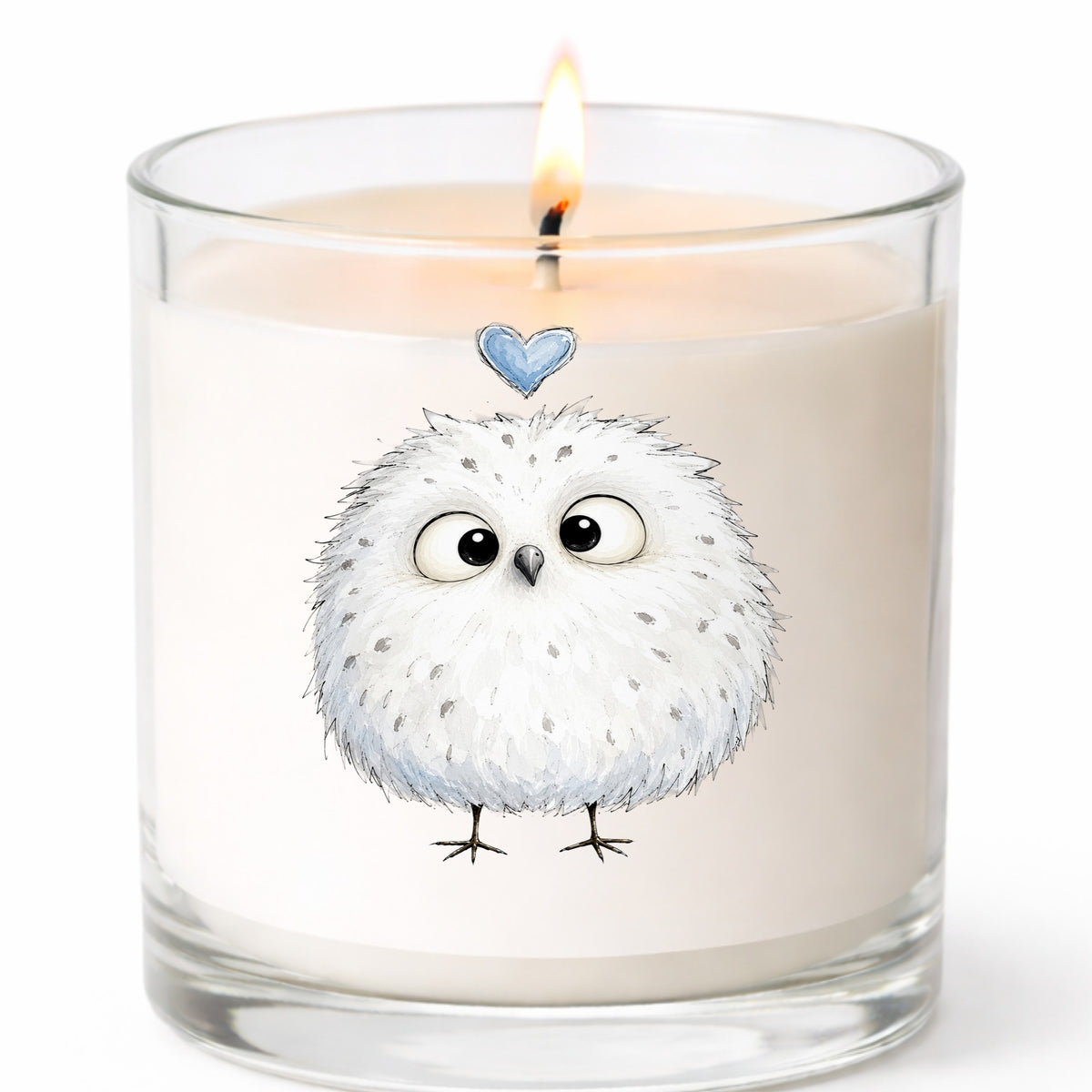 Fluffy White Owl UV DTF sticker applied to a white candle in a clear glass jar