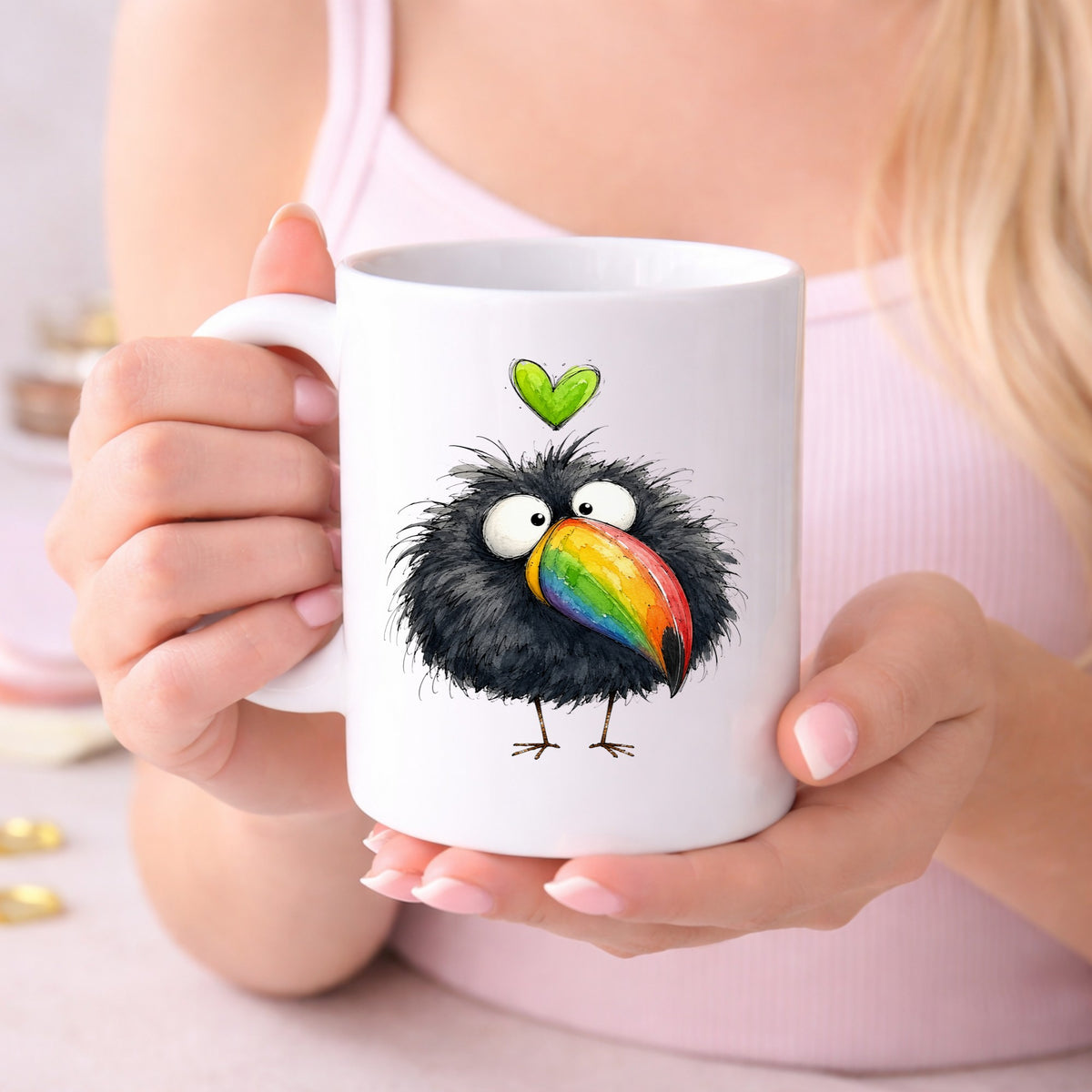 Funny Toucan Rainbow Beak UV DTF sticker applied to a white coffee mug held in both hands