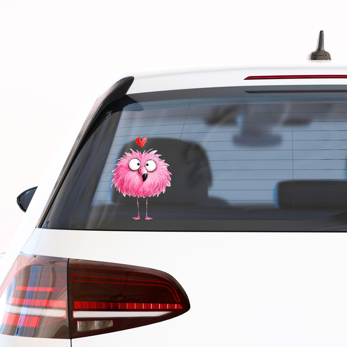 Fluffy Pink Flamingo UV DTF sticker applied to the rear window of a white car