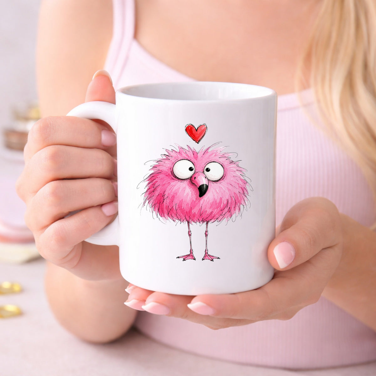 Fluffy Pink Flamingo UV DTF sticker applied to a white coffee mug held in both hands