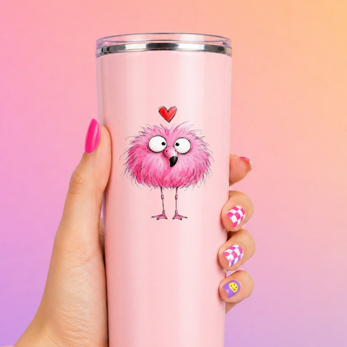 Fluffy Pink Flamingo UV DTF sticker applied to a tall pink tumbler on a pink and orange background