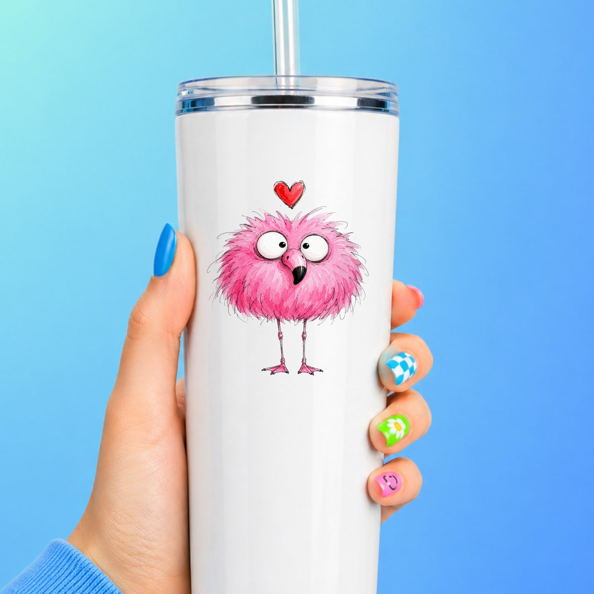 Fluffy Pink Flamingo UV DTF sticker applied to a white straw tumbler on a blue background