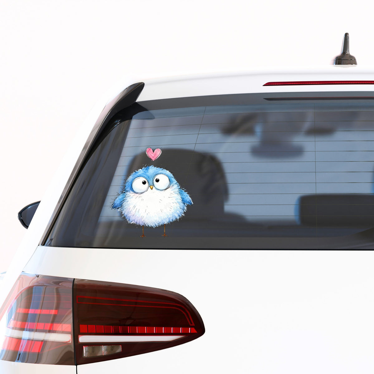 Fluffy Bluebird UV DTF sticker applied to the rear window of a white car