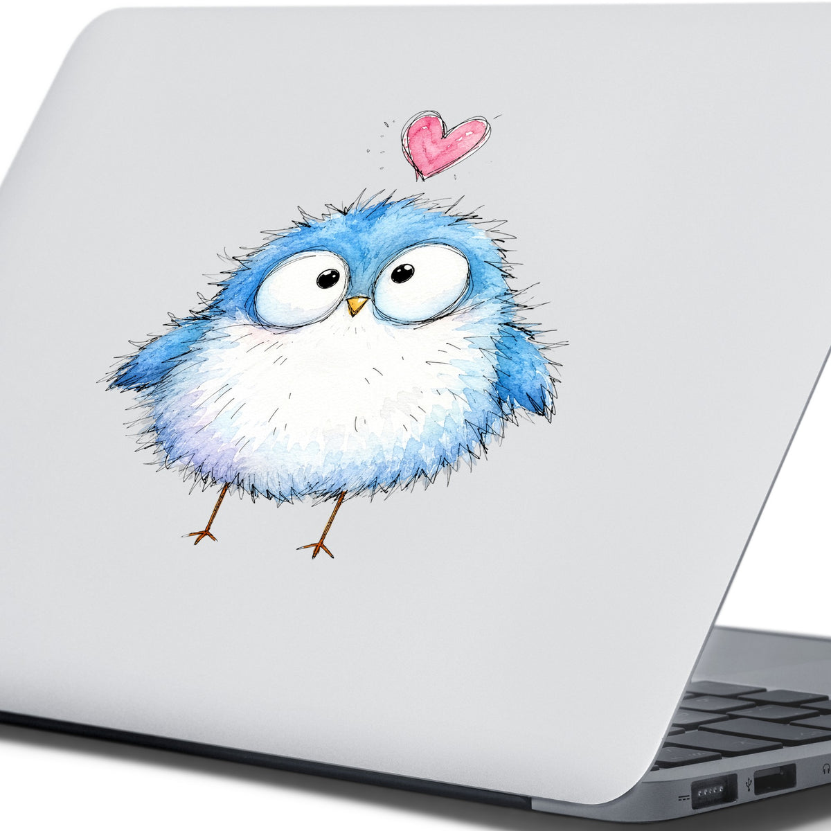Fluffy Bluebird UV DTF sticker applied to the lid of a silver laptop