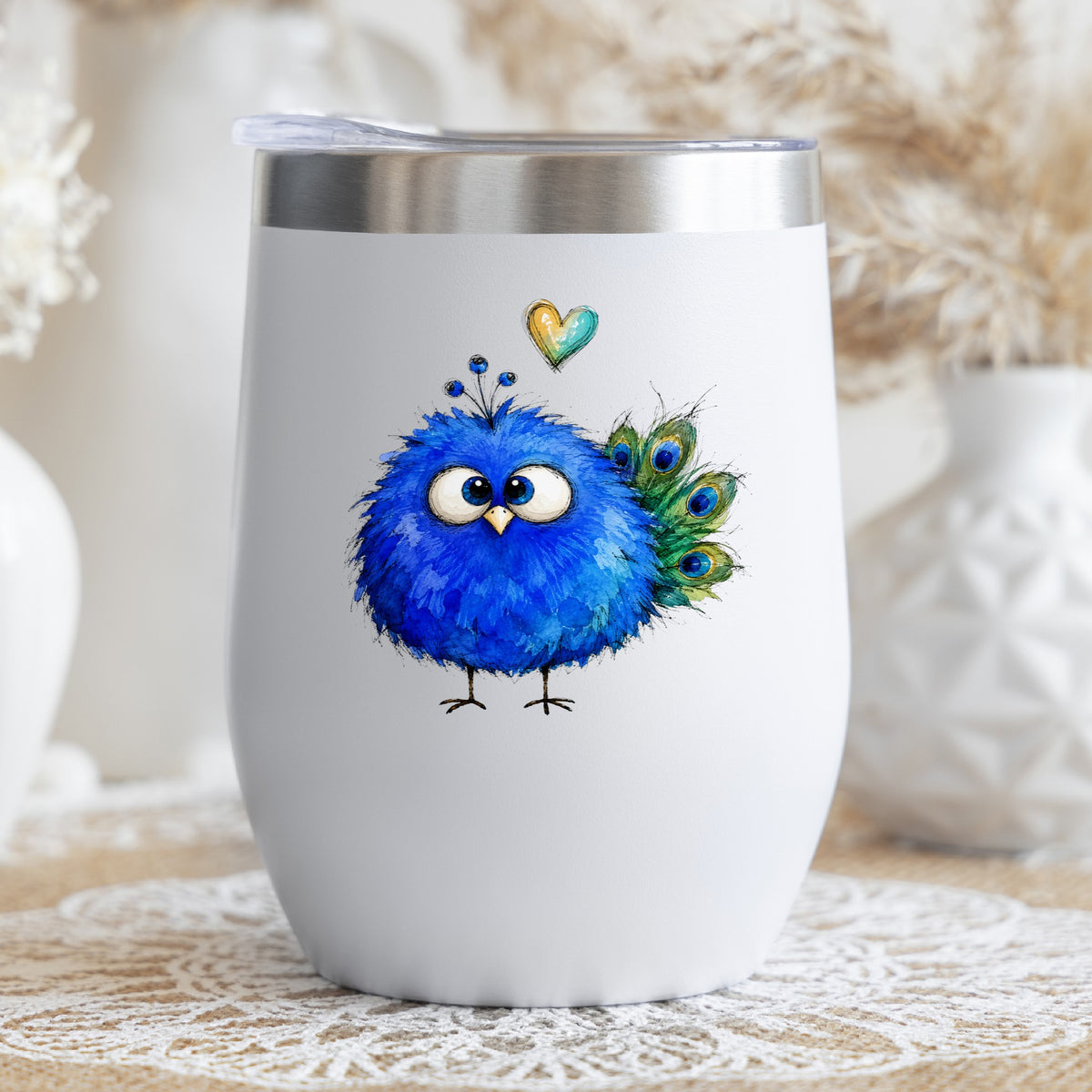 Blue Peacock Crest UV DTF sticker applied to a white stemless tumbler with a lid