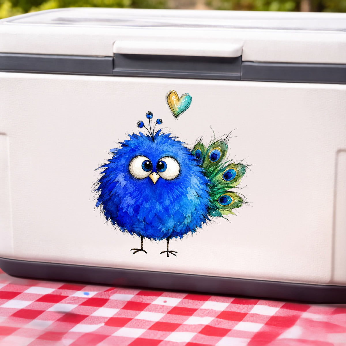 Blue Peacock Crest UV DTF sticker applied to a white cooler on a red gingham cloth