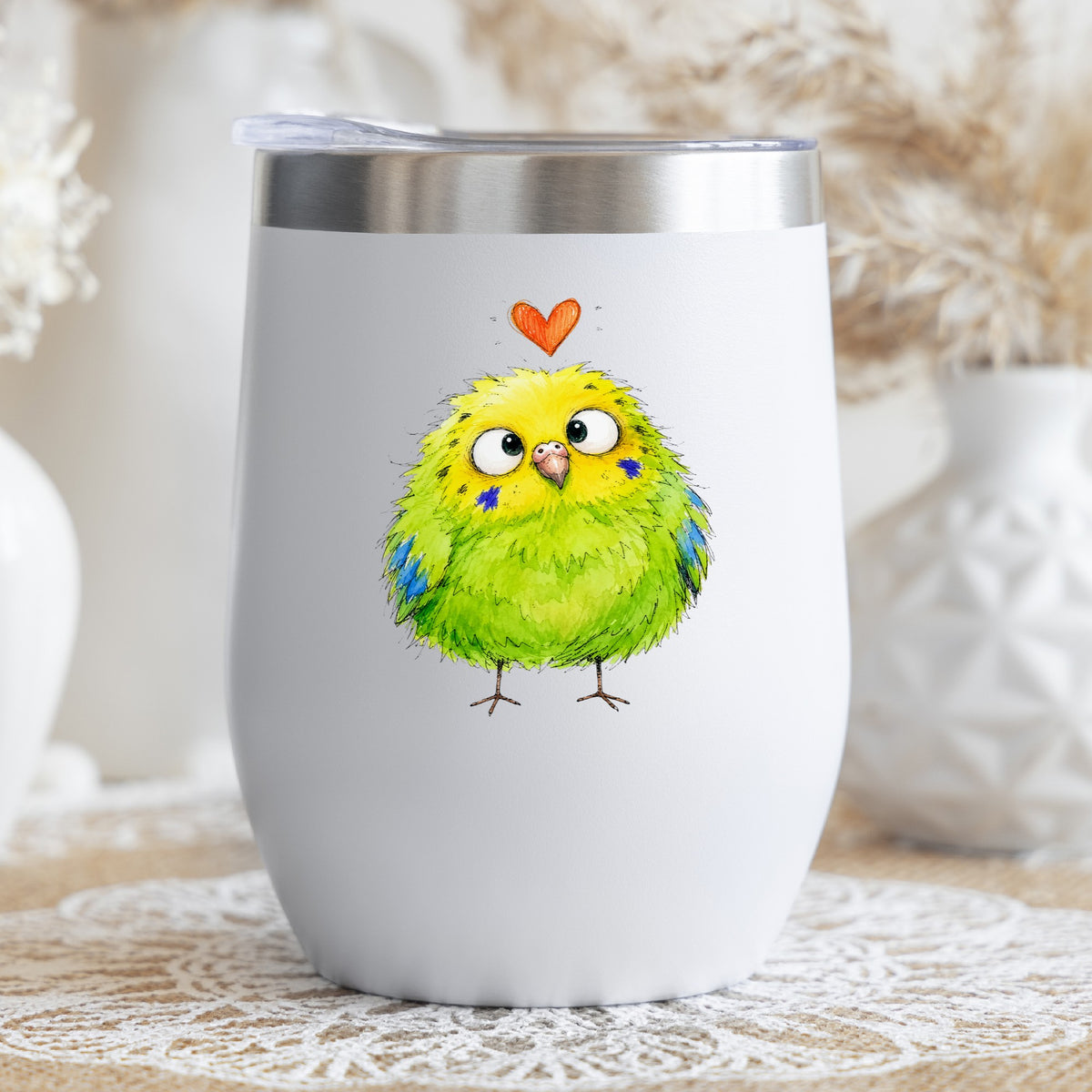 Funny Green Budgie UV DTF sticker applied to a white stemless tumbler with a lid