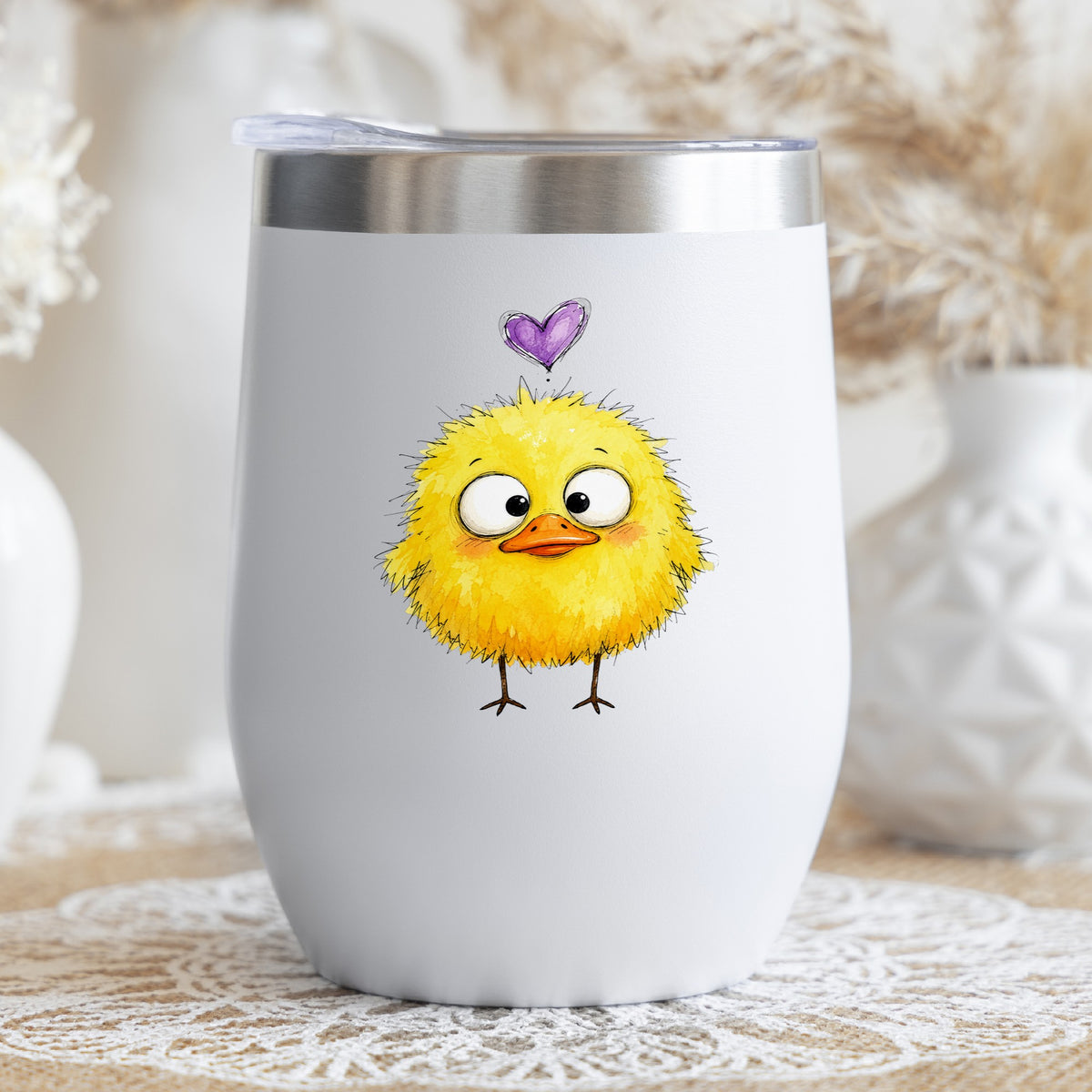 Funny Yellow Baby Duck UV DTF sticker applied to a white stemless tumbler with a lid