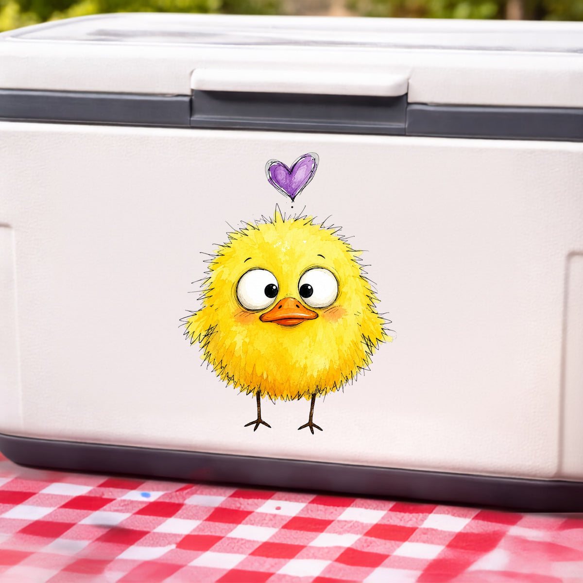 Funny Yellow Baby Duck UV DTF sticker applied to a white cooler on a red gingham cloth