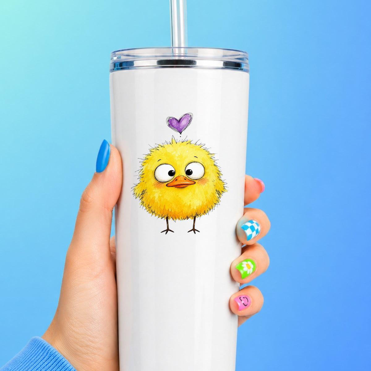Funny Yellow Baby Duck UV DTF sticker applied to a white straw tumbler on a blue background