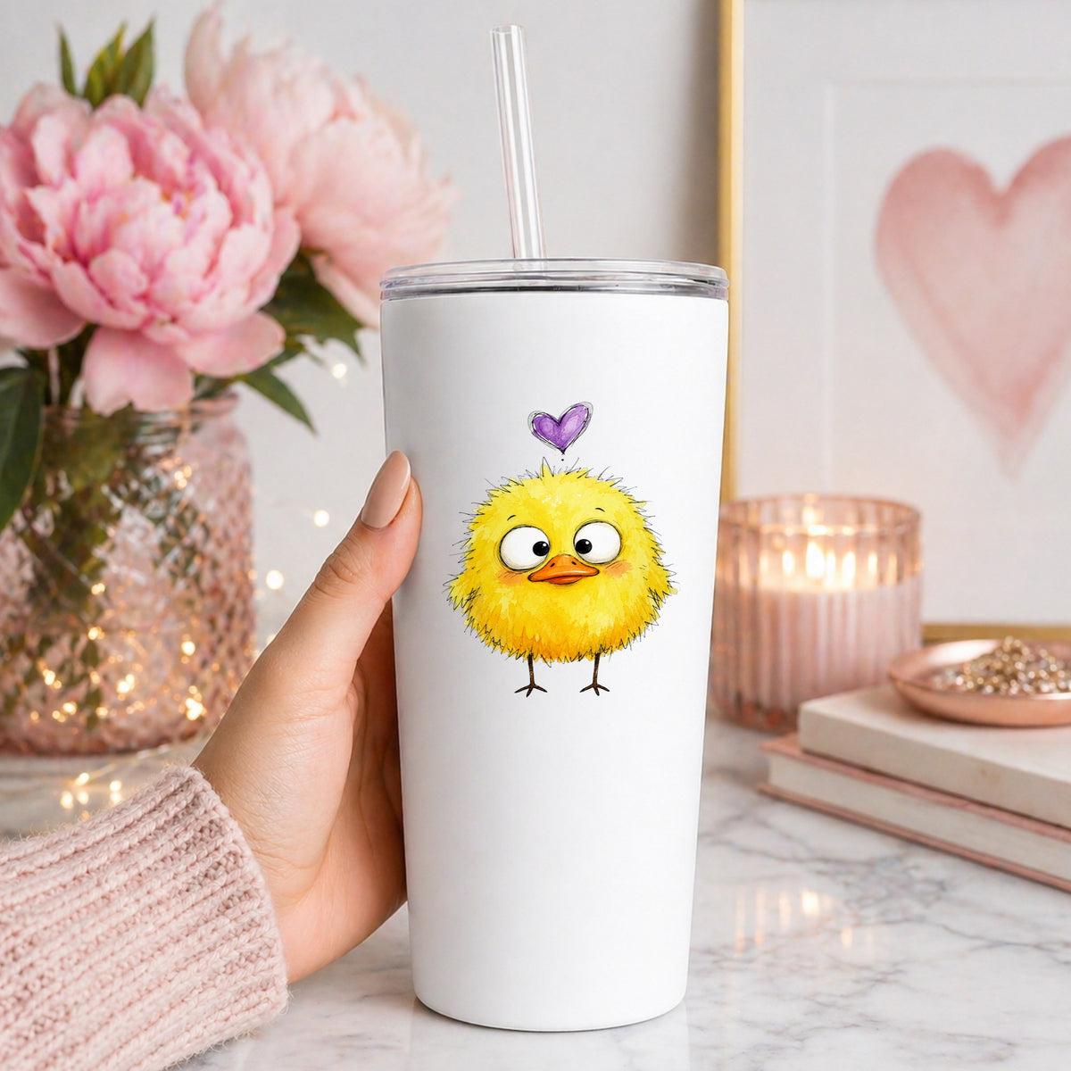 Funny Yellow Baby Duck UV DTF sticker applied to a white straw tumbler beside pink peonies