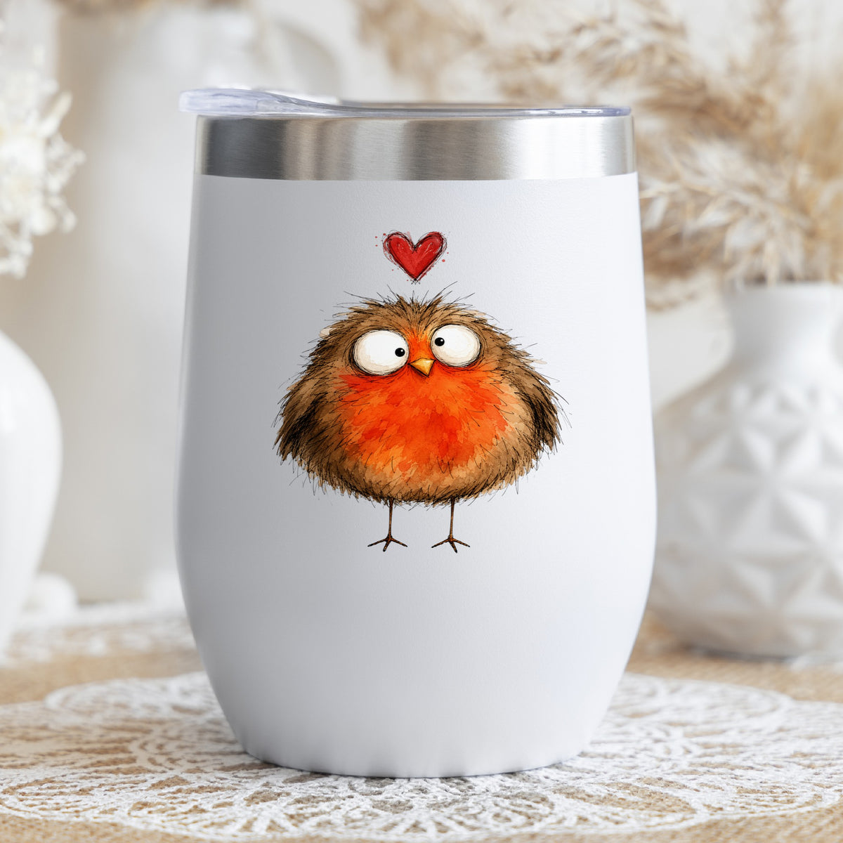 Round Robin Bird UV DTF sticker applied to a white stemless tumbler with a lid