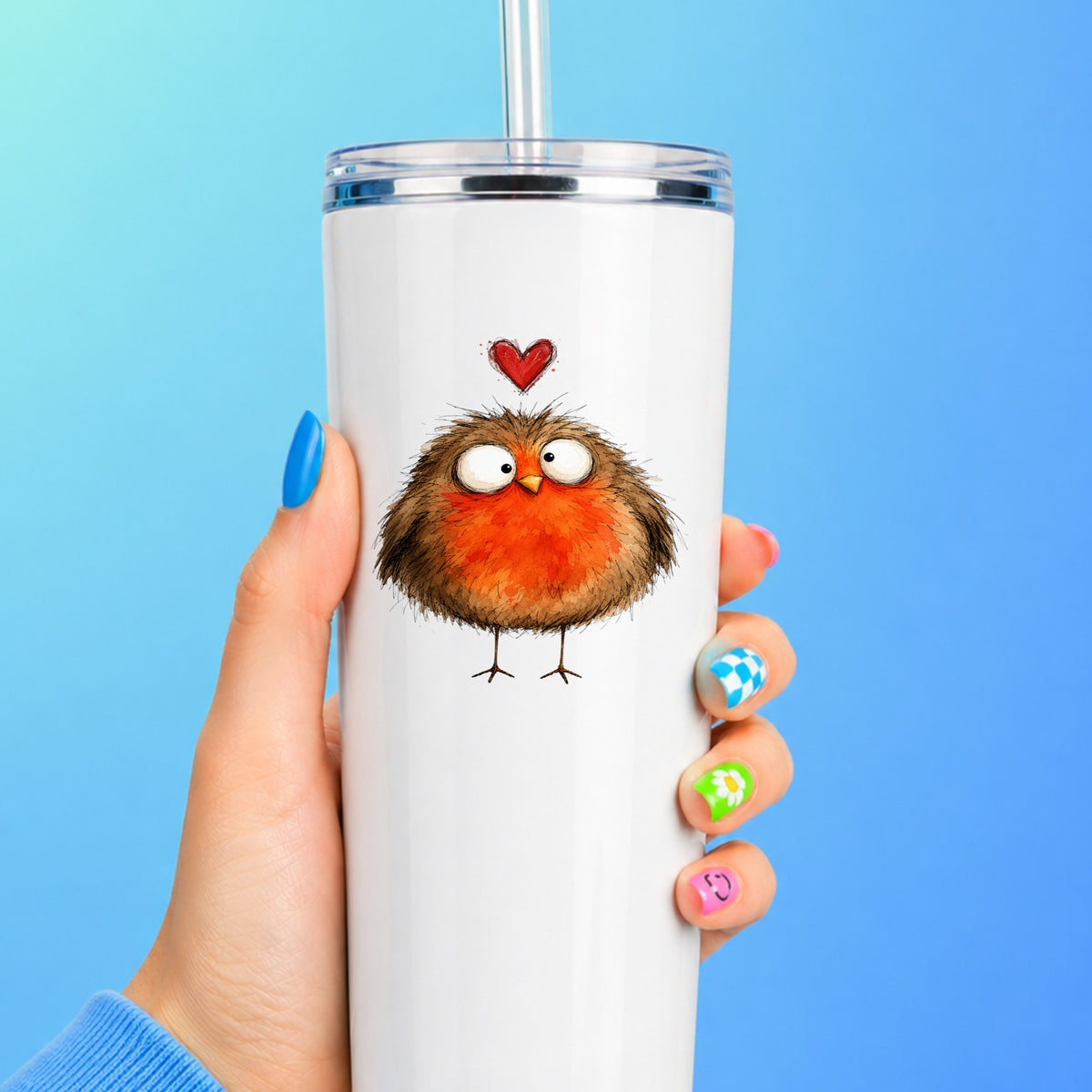 Round Robin Bird UV DTF sticker applied to a white straw tumbler on a blue background