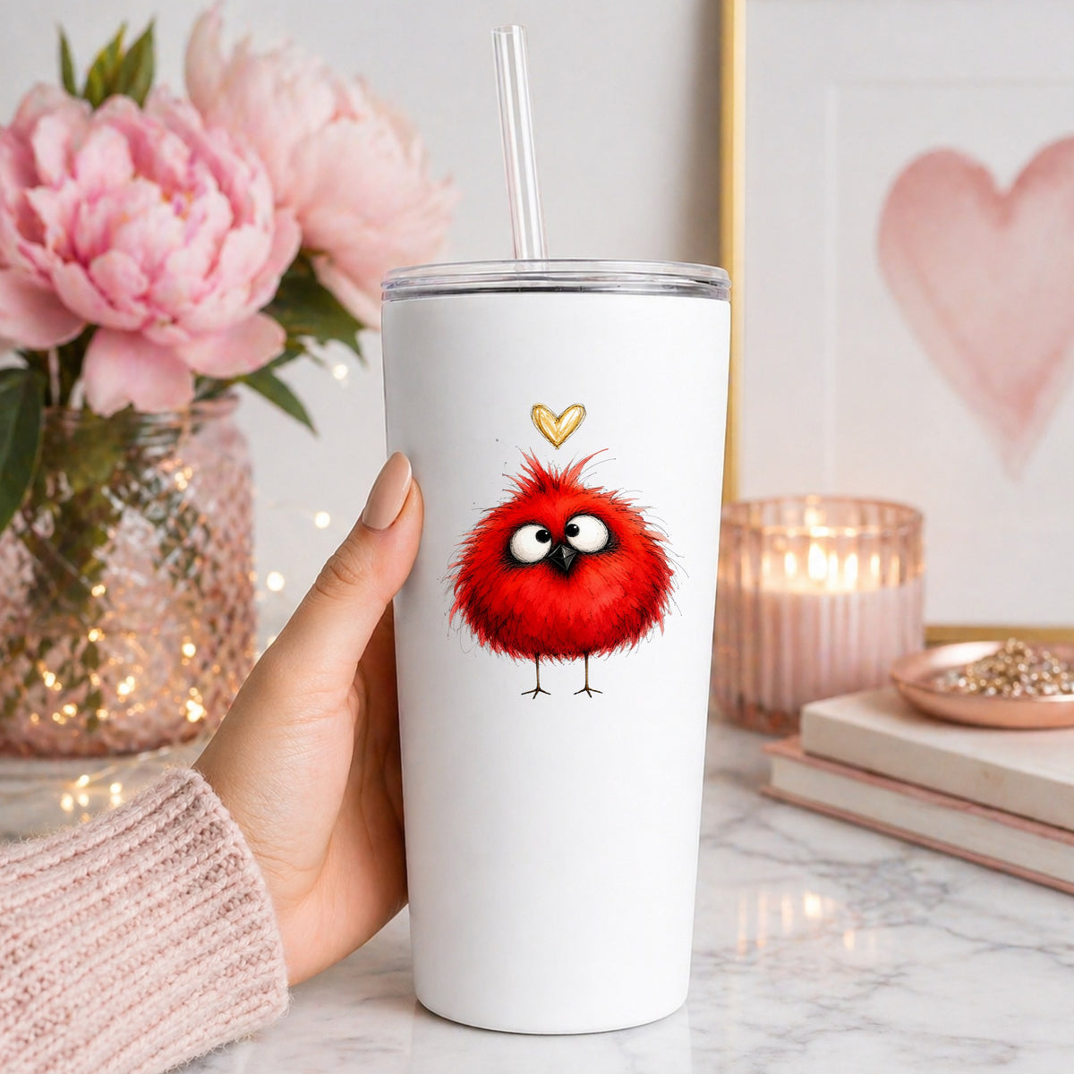Funny Red Cardinal UV DTF sticker applied to a white straw tumbler beside pink peonies