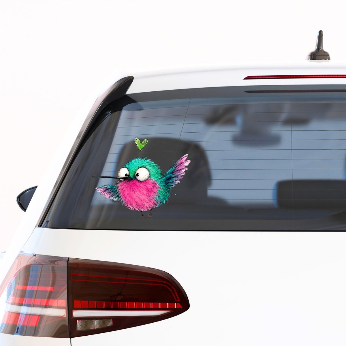 Flying Cartoon Hummingbird UV DTF sticker applied to the rear window of a white car