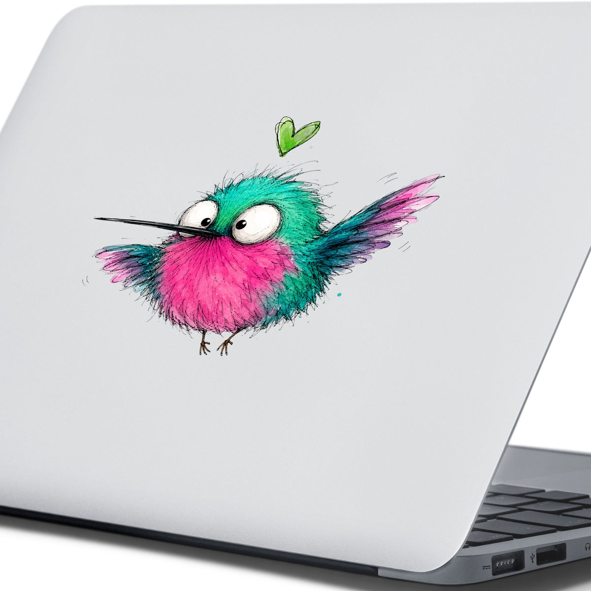 Flying Cartoon Hummingbird UV DTF sticker applied to the lid of a silver laptop