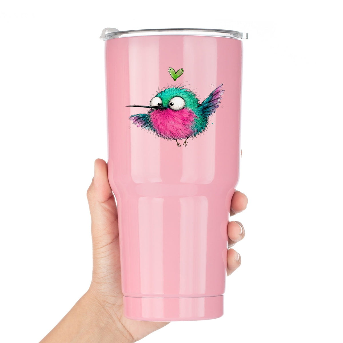 Flying Cartoon Hummingbird UV DTF sticker applied to a pink tumbler held against a white background