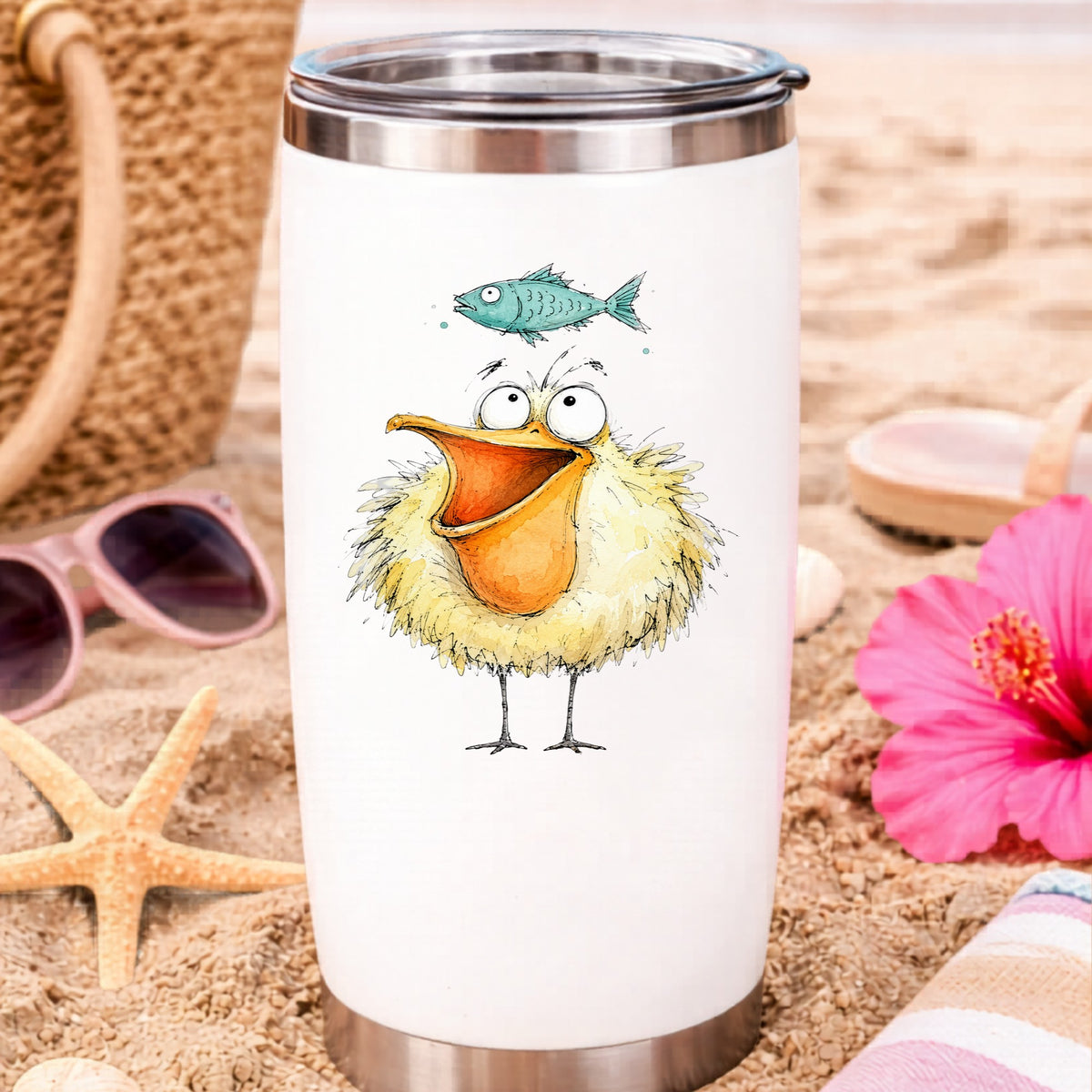 Funny Pelican With Fish UV DTF sticker applied to a white travel tumbler on beach sand