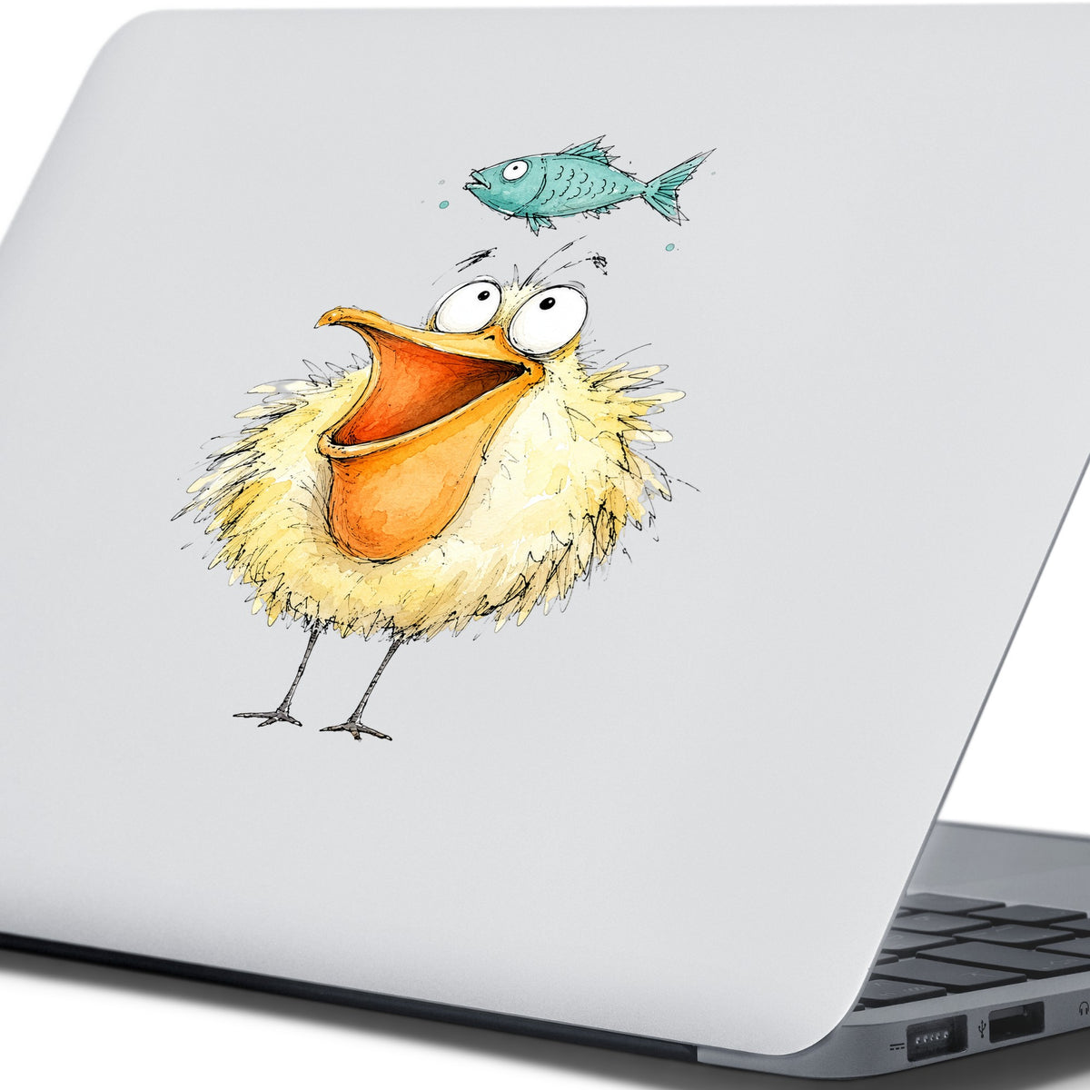 Funny Pelican With Fish UV DTF sticker applied to the lid of a silver laptop