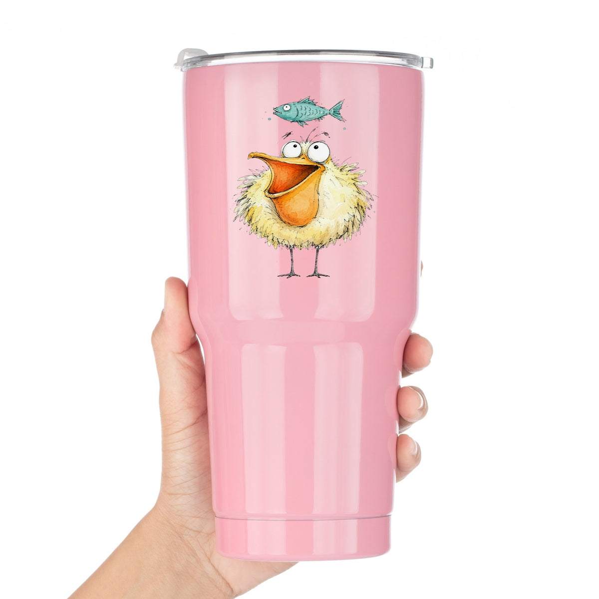 Funny Pelican With Fish UV DTF sticker applied to a pink tumbler held against a white background
