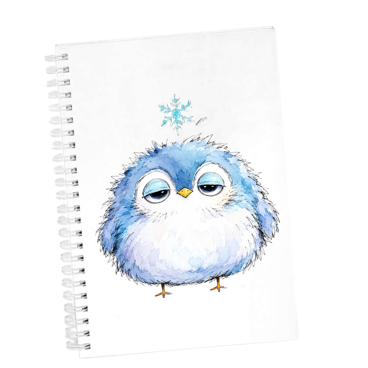 Sleepy Blue Bird Snowflake UV DTF sticker applied to the cover of a white spiral journal