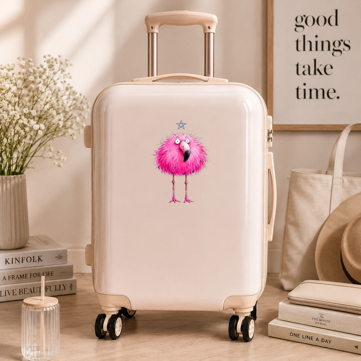 Pink Flamingo With Star UV DTF sticker applied to a cream carry-on suitcase