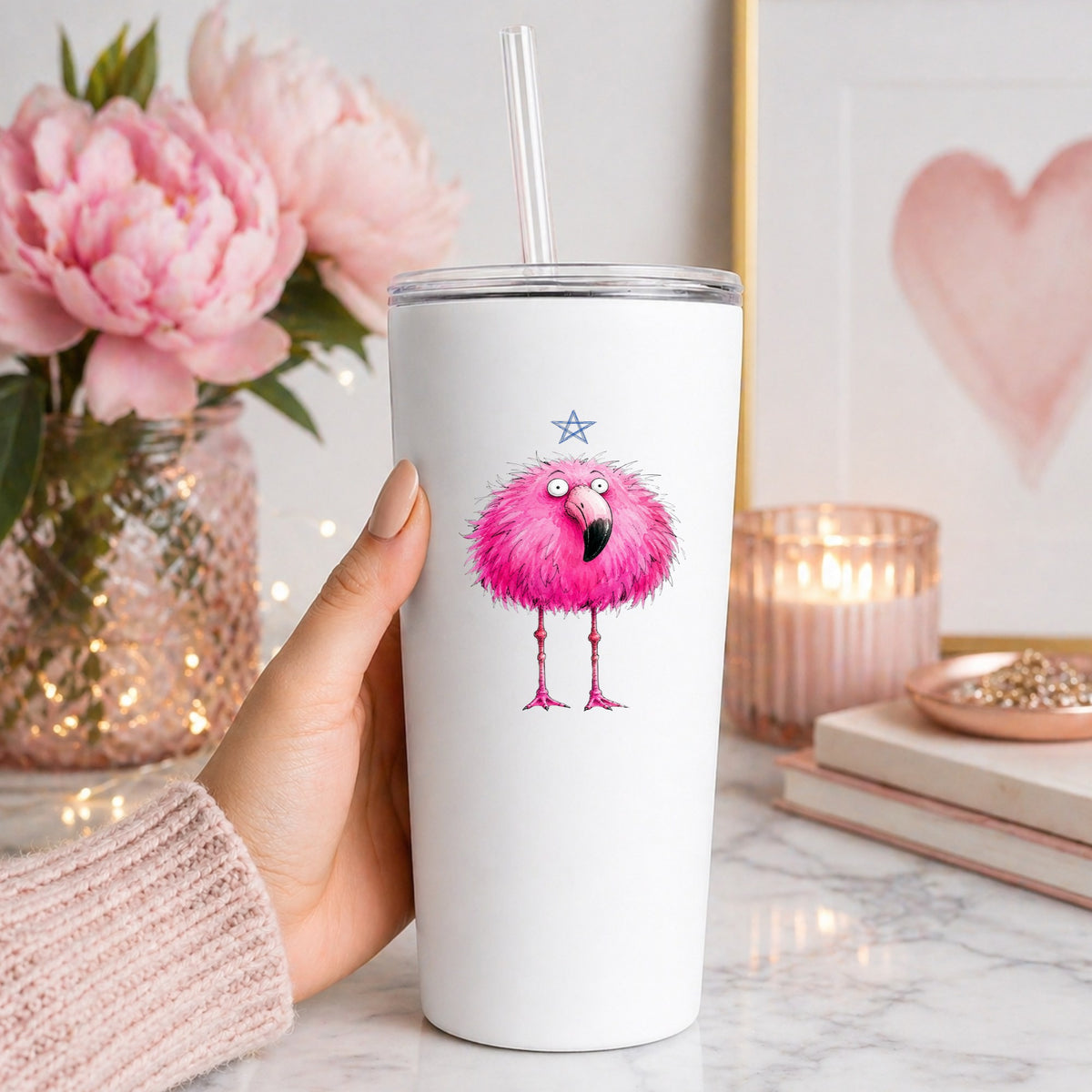 Pink Flamingo With Star UV DTF sticker applied to a white straw tumbler beside pink peonies