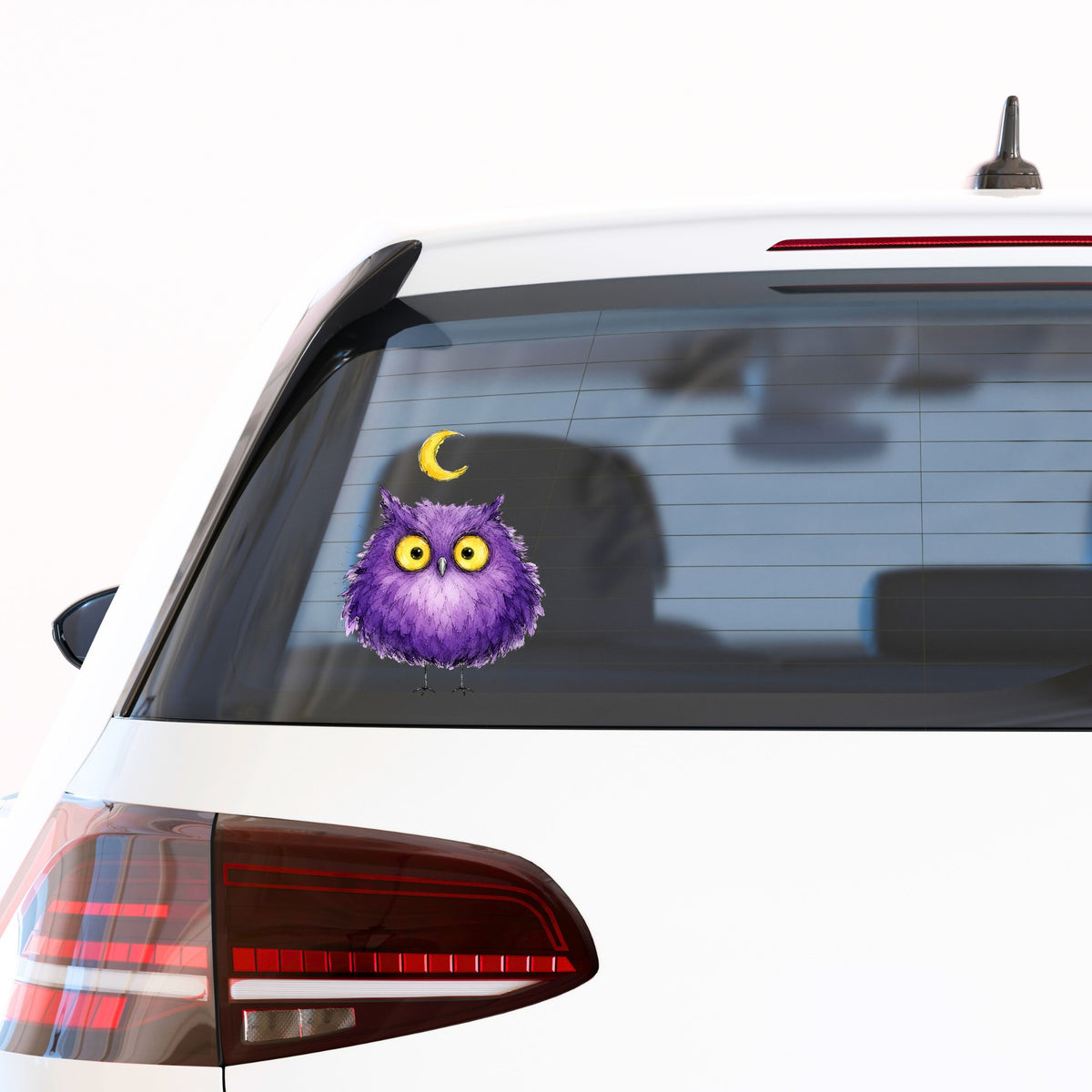 Purple Owl Crescent Moon UV DTF sticker applied to the rear window of a white car