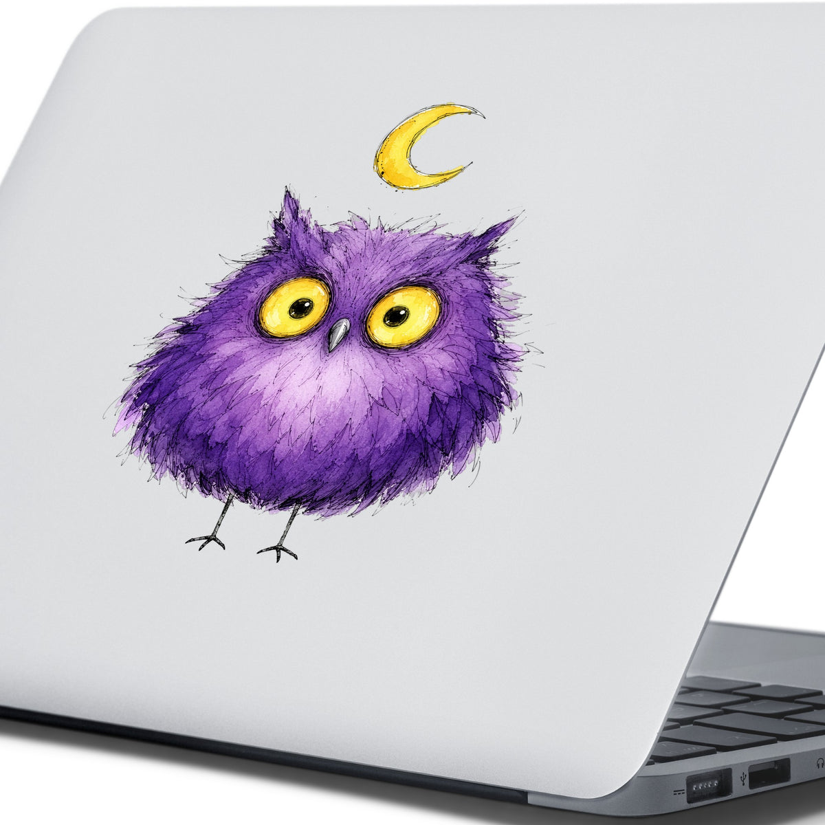 Purple Owl Crescent Moon UV DTF sticker applied to the lid of a silver laptop