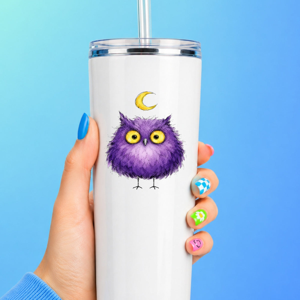 Purple Owl Crescent Moon UV DTF sticker applied to a white straw tumbler on a blue background