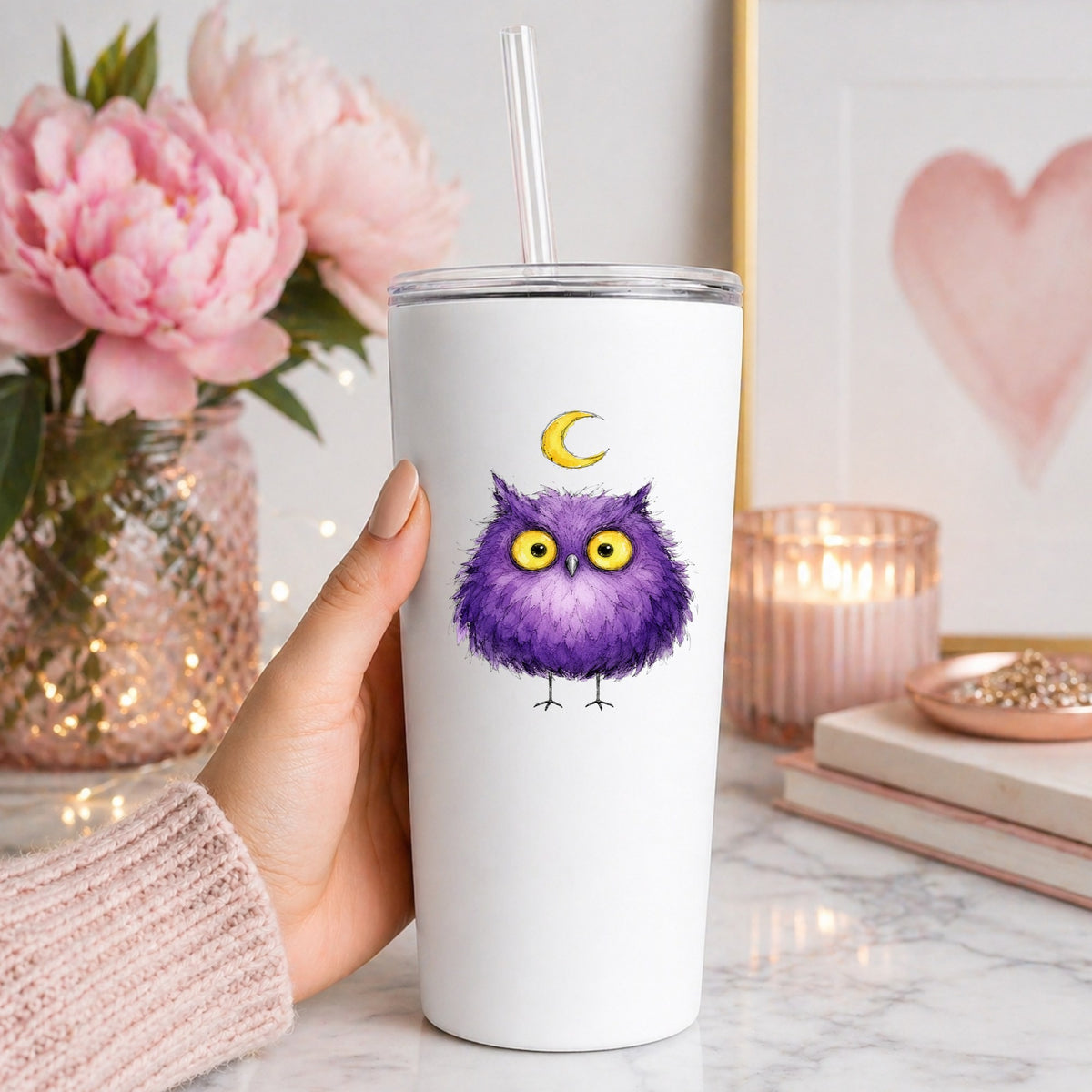 Purple Owl Crescent Moon UV DTF sticker applied to a white straw tumbler beside pink peonies