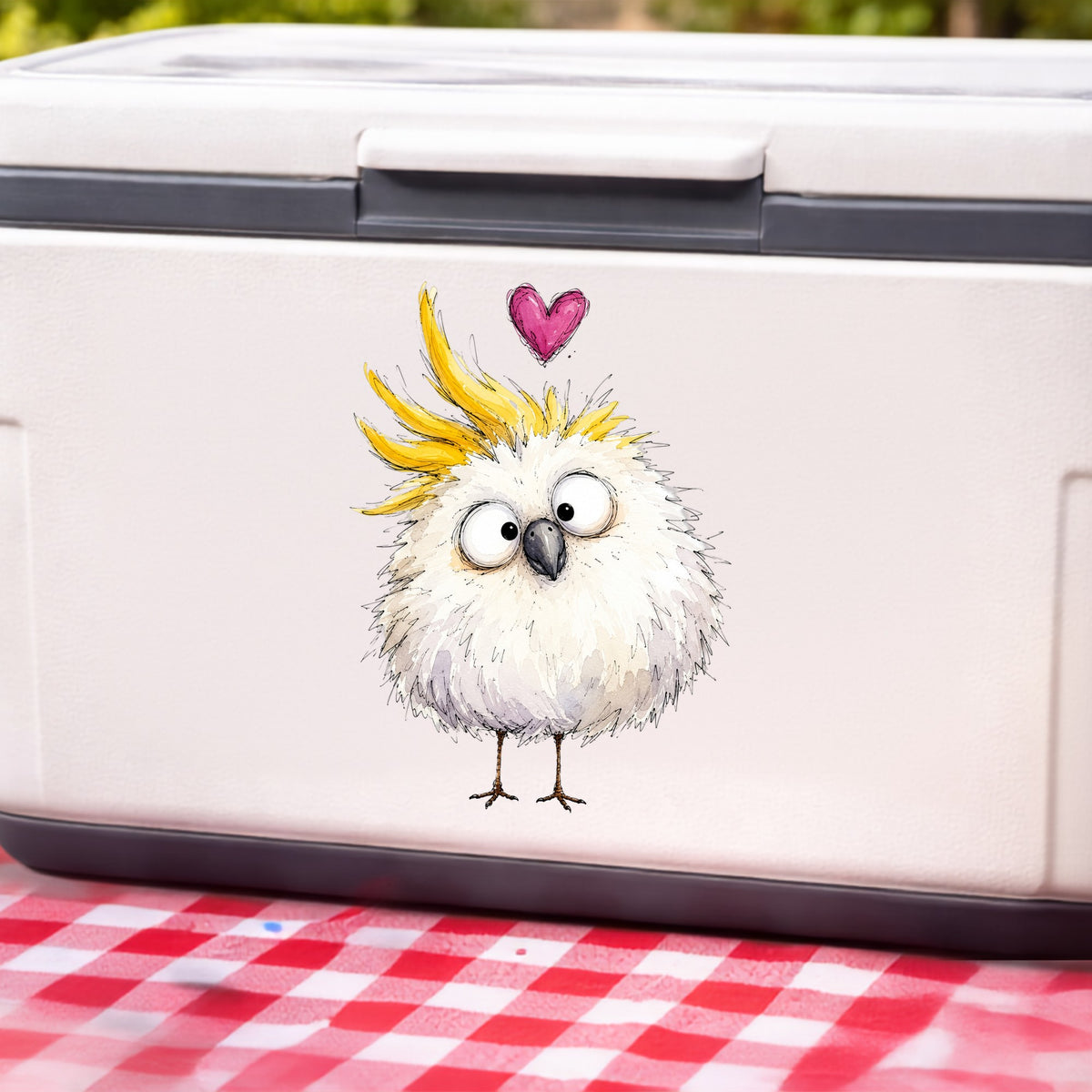 Funny White Cockatoo UV DTF sticker applied to a white cooler on a red gingham cloth