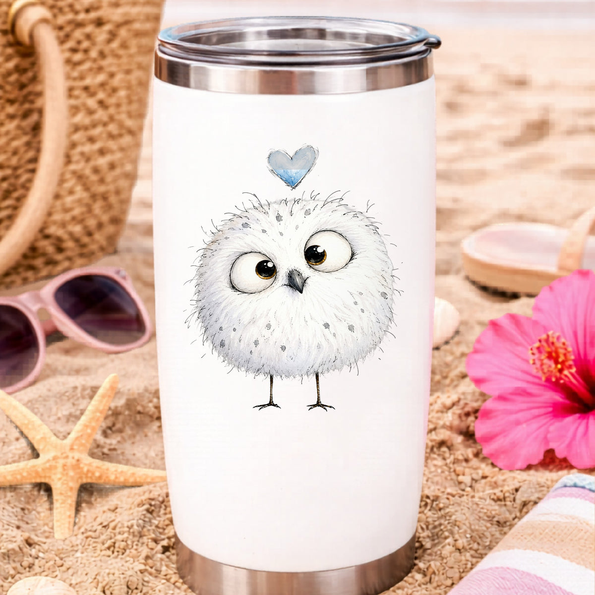 Round White Owl UV DTF sticker applied to a white travel tumbler on beach sand