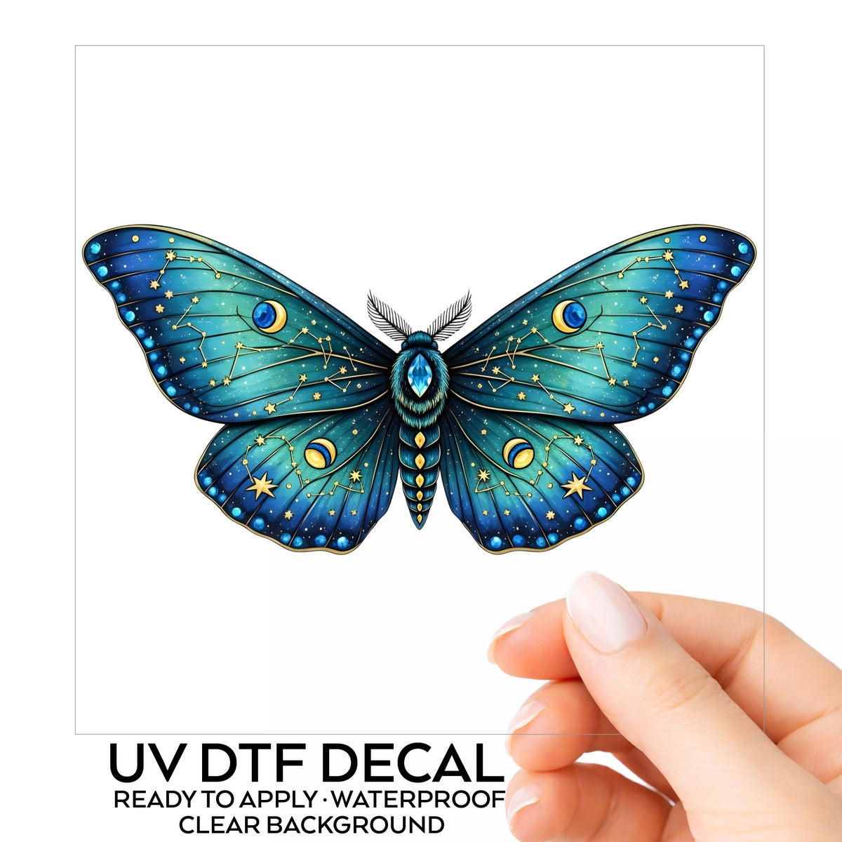 Teal Celestial Moth UV DTF sticker on its backing card, held in hand